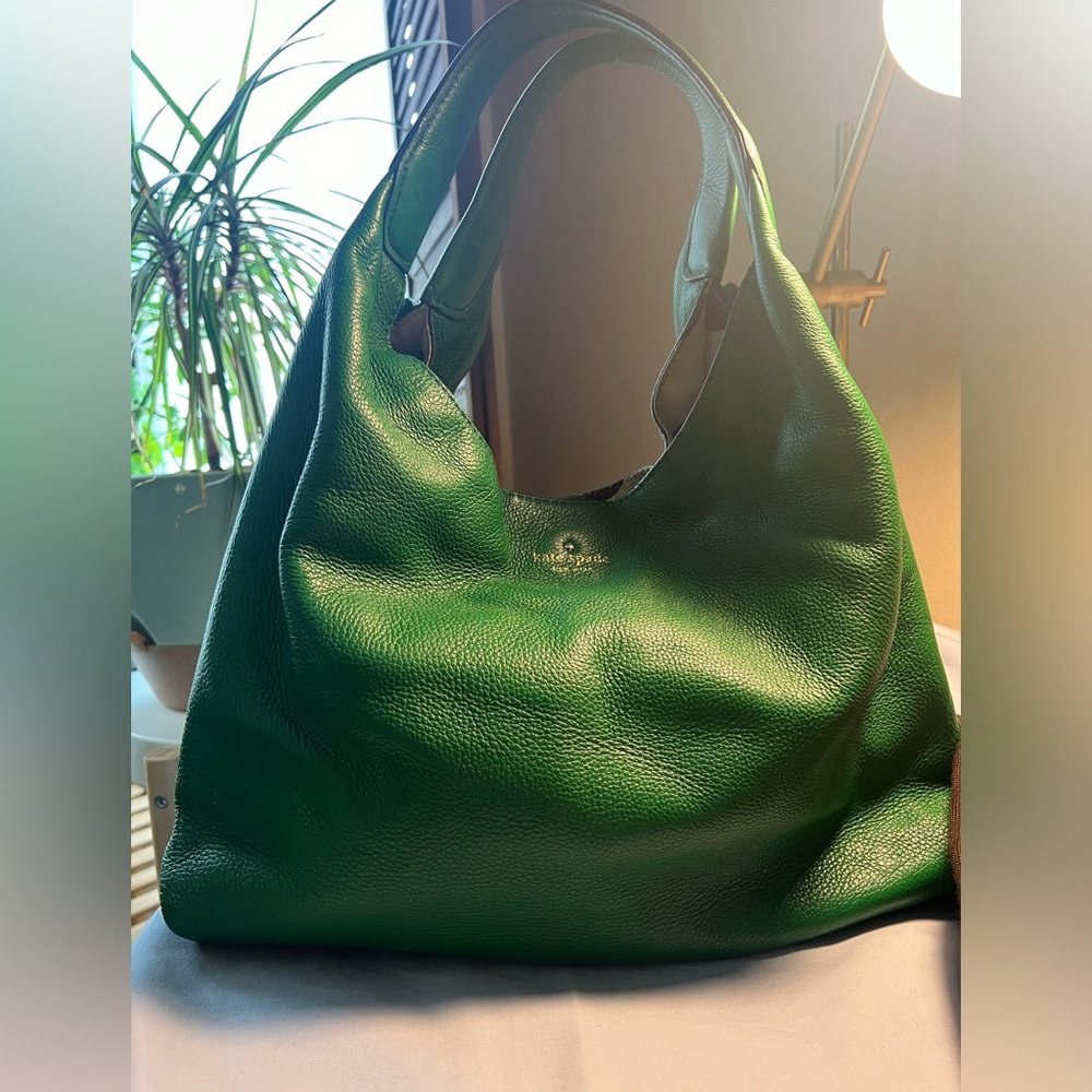 Kate Spade Hobo Bag in bright beautiful green with gold zippers and clasp.